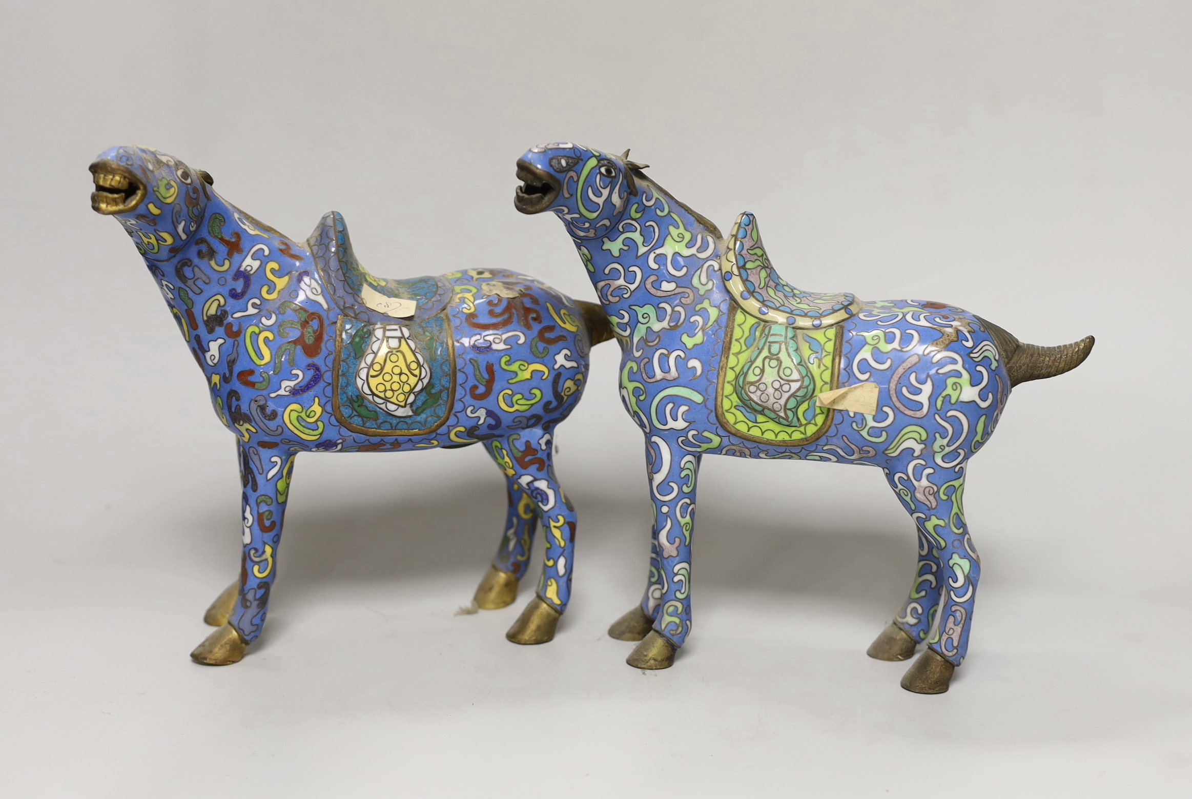 A pair of 20th century Chinese export cloisonné enamel horses, 21cm high